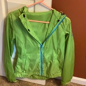 Women’s Sierra Designs wind breaker jacket, with hood and zipper closure